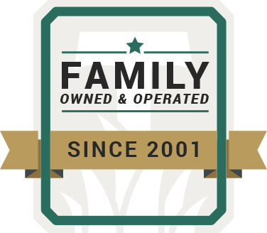 Badge Indicating Turf Tenders Service is family owned and operated since 2001